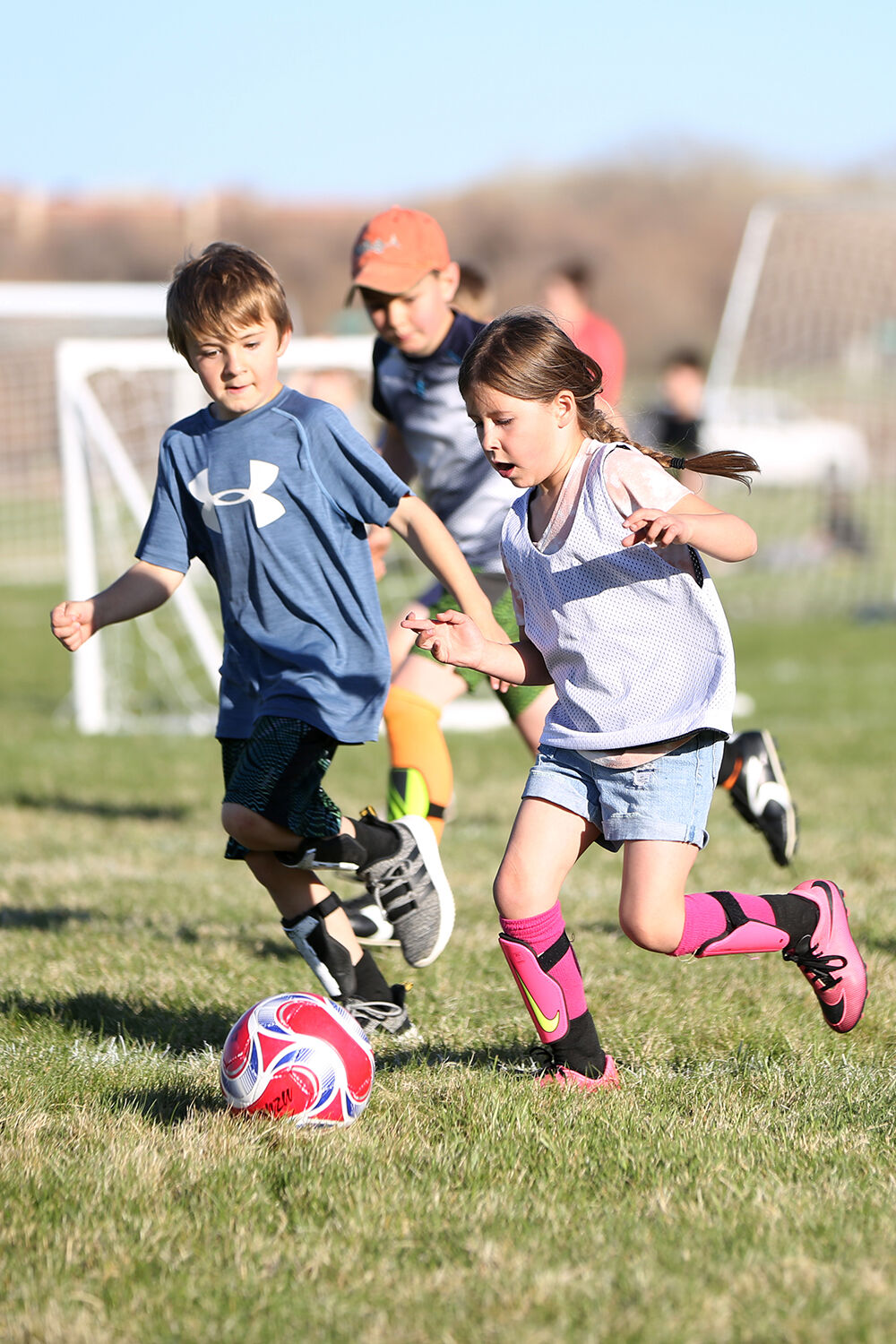 Steely Arnold dribbles the ball downfield as she attempts to break away